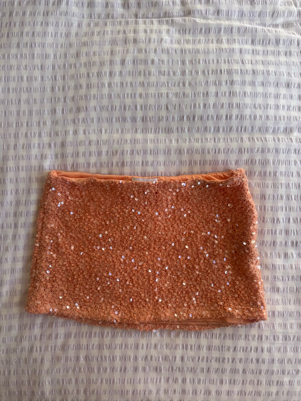 Orange sequin mini skirt