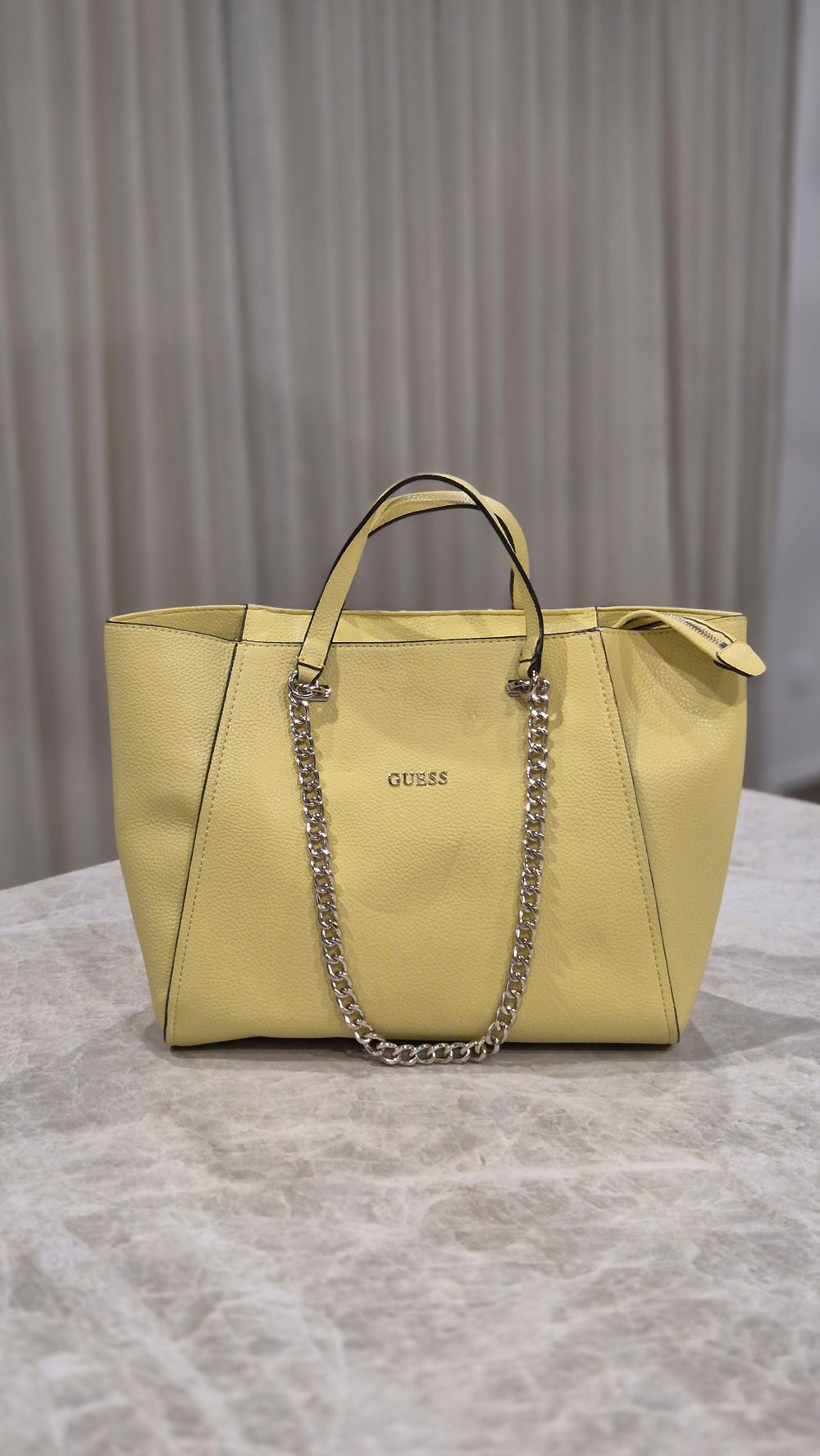 Yellow faux leather handbag with chains