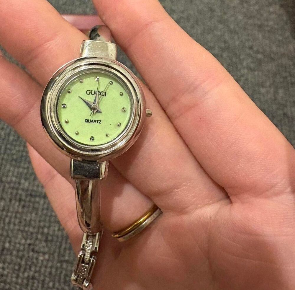 Gucci Silver Tone Interchangeable Bezel Watch