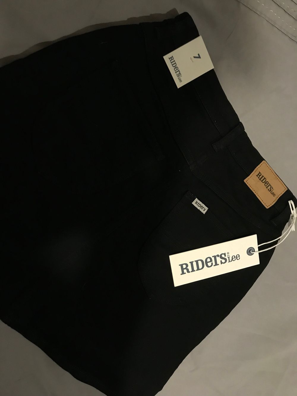 Black denim riders by Lee skirt