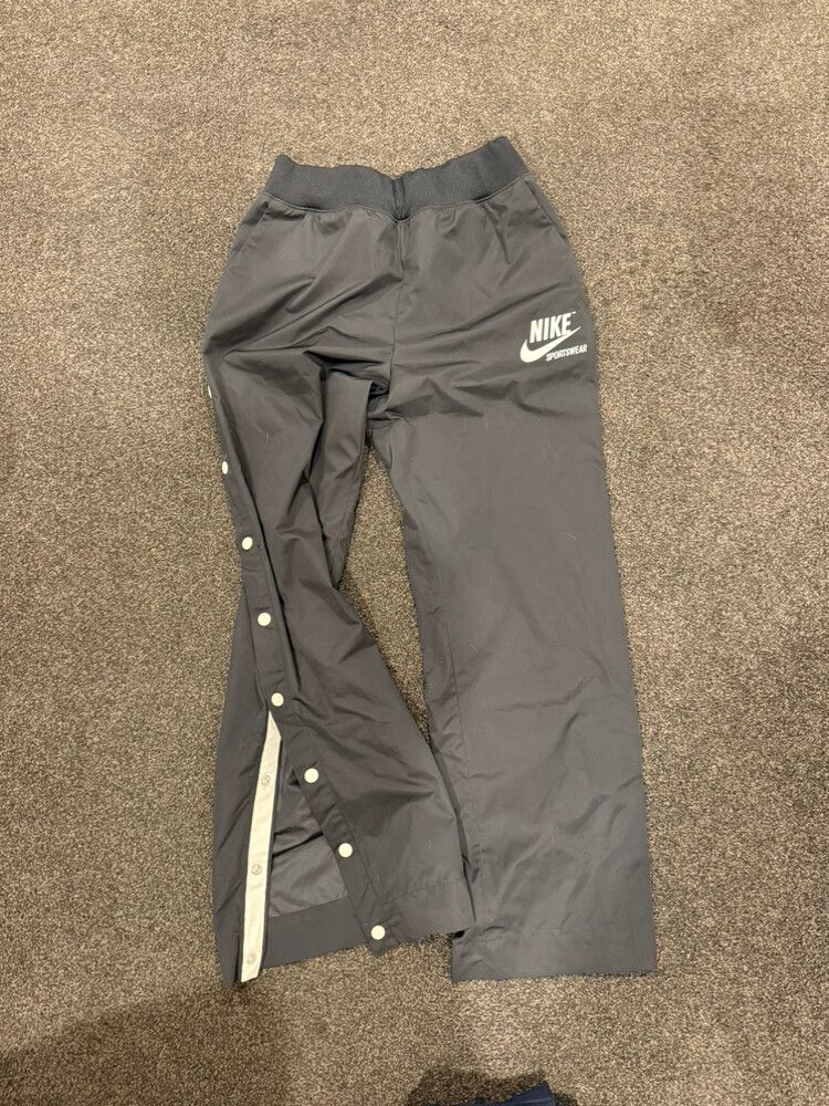 nike track pants buttons