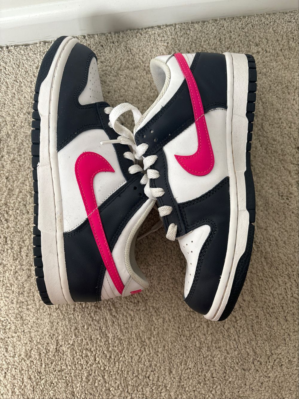 black nike pink tick