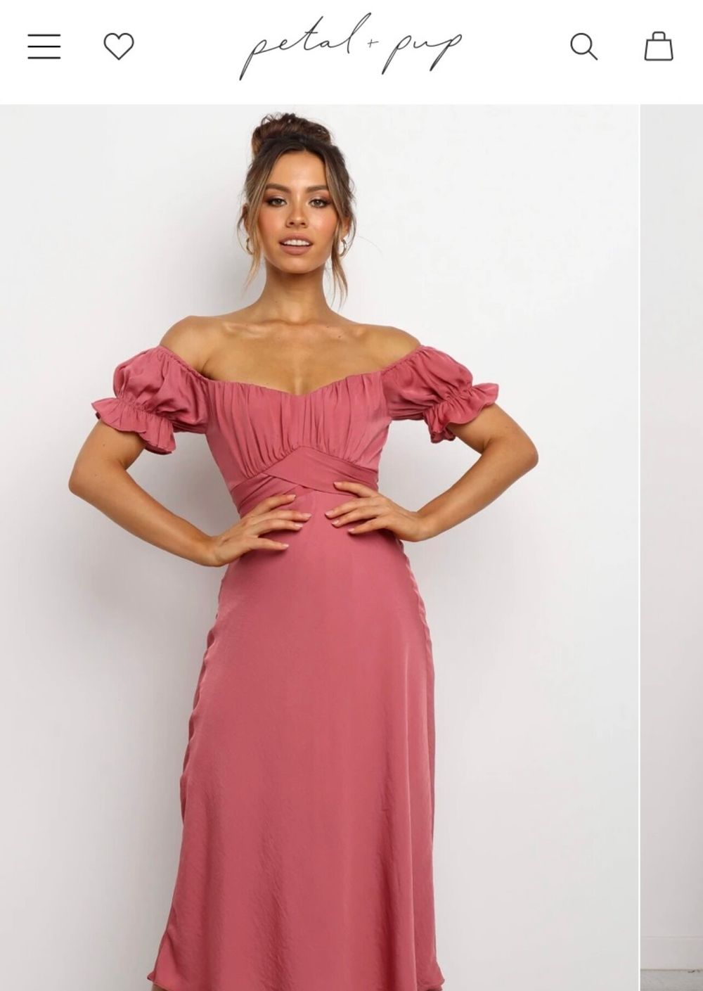 strapless open back dress High-waisted pink mid-flare trousers with a pressed crease  Rinascimento
