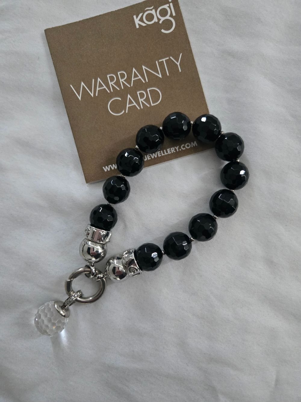 Kagi black bracelet with charm