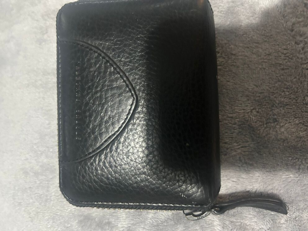 status anxiety wallet