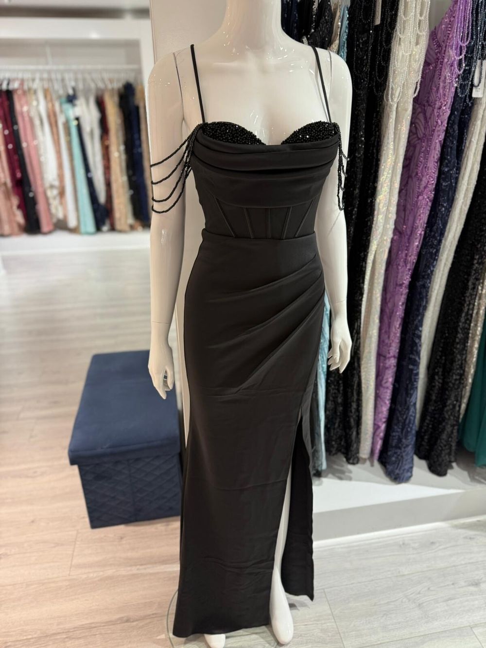 Corset style black dress with detailing