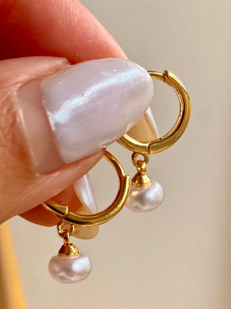 ✨ Timeless Gold & Pearl Drop Earrings ✨  Elevate your look with these 18K gold-filled stainless steel hoop earrings, featuring delicate freshwater pearls for a touch of effortless elegance. Waterproof, tarnish-free, and hypoallergenic, these hoops are des
