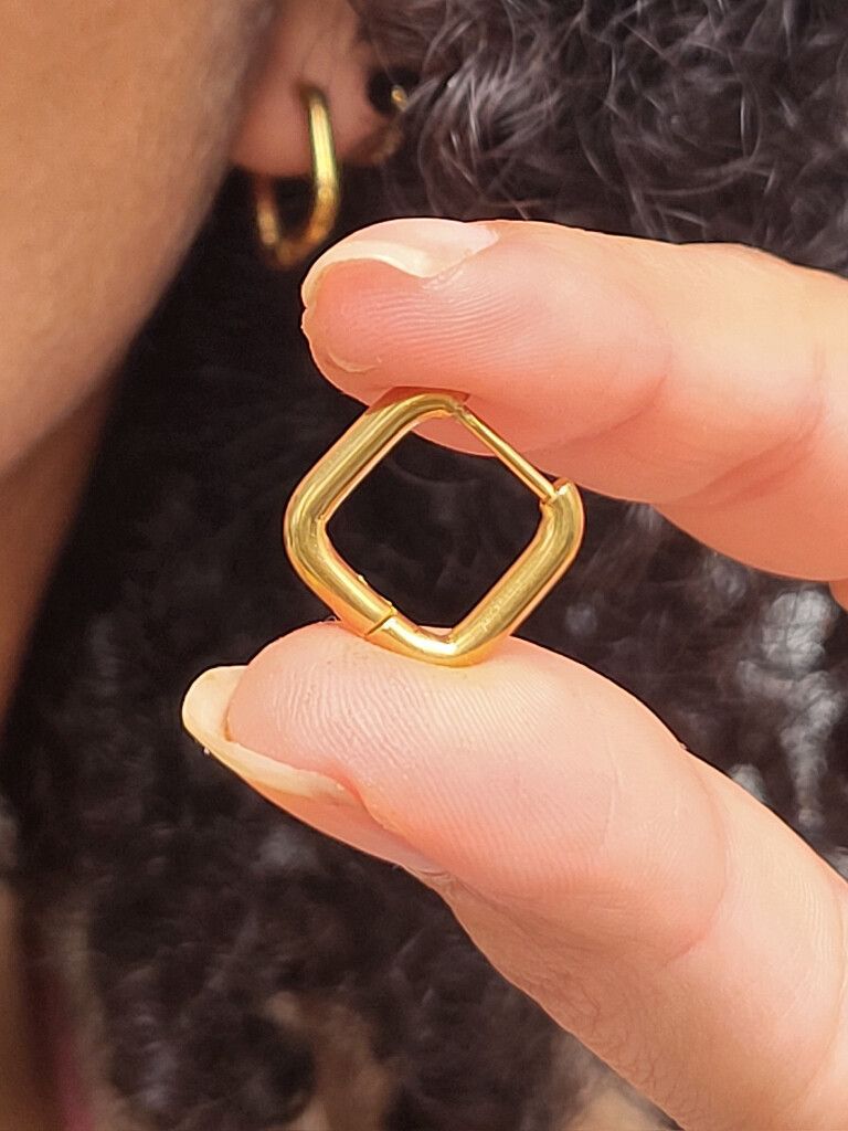 Bold Square Hoops – Lifeproof Luxe in a Modern Twist  Upgrade your ear game with these bold square hoops – a unique twist on the classic gold earring. Crafted in 18K gold-filled stainless steel, they’re fully waterproof, tarnish-free, hypoallergenic, and