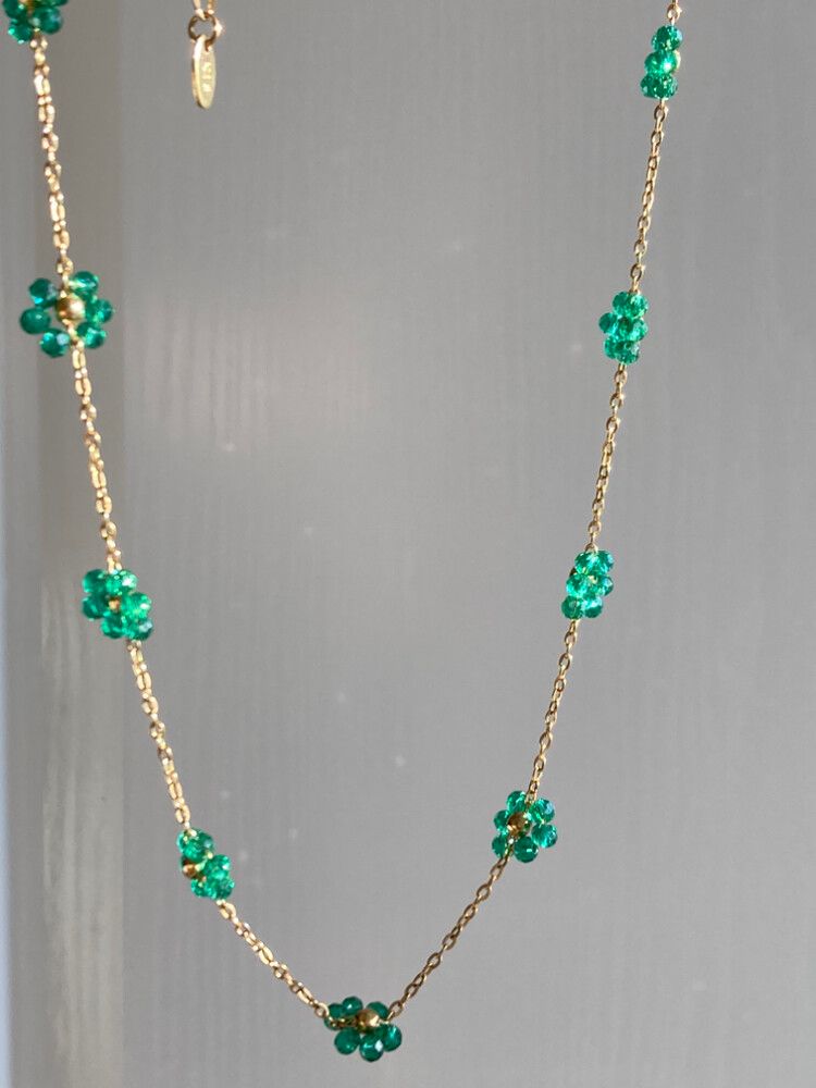 ✨Emerald Daisy dainty Necklace✨  Dainty and feminine, this vintage-style piece features delicate green floral beads spaced evenly on a bright 18k gold filled stainless steel chain. It’s fully waterproof, tarnish-free, hypoallergenic, and won’t fade or col