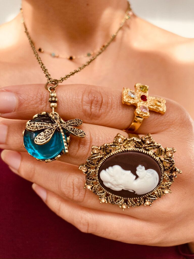 Whimsy Dragonfly Pendant Necklace A ✨must-have✨ for whimsygoth lovers. This dreamy piece features a vintage-style brass chain and a domed ocean-blue resin pendant topped with a delicate dragonfly. It channels mystical forest energy and moonlit cottagecore