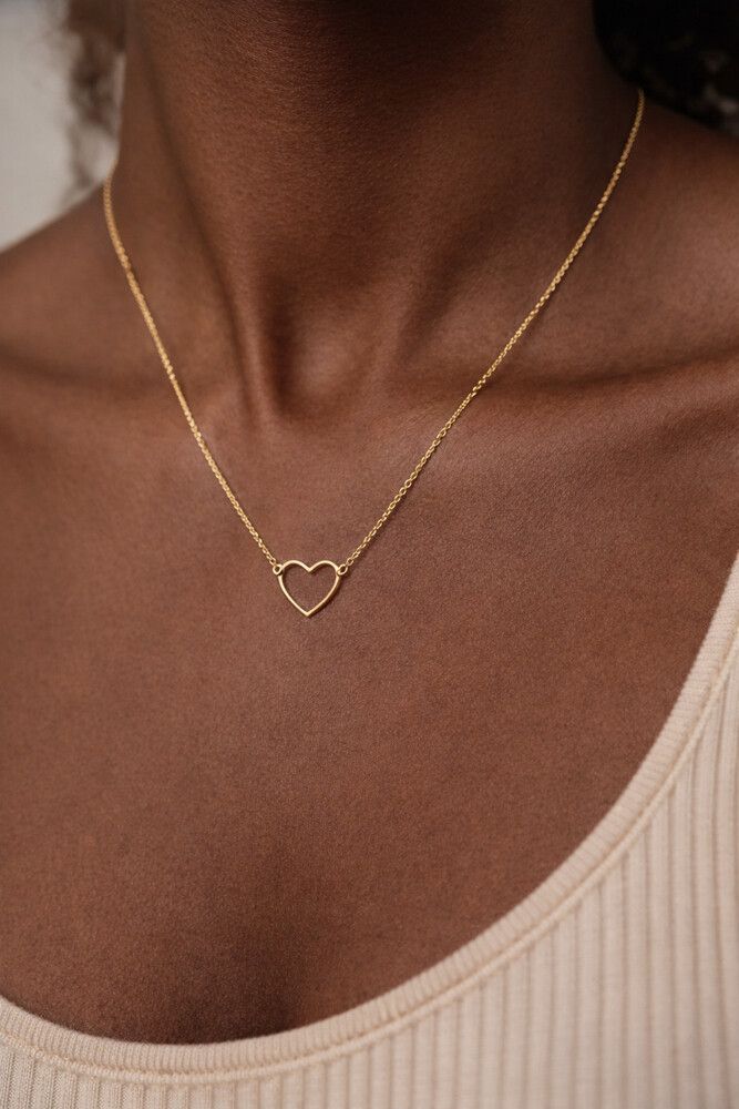 ✨ Minimalist gold Heart Necklace ✨ Quiet Luxury Essential  Fall in love with simplicity. This delicate 18k gold-filled stainless steel necklace embodies modern elegance with its fine chain and open-heart pendant, designed to glow softly against the skin w