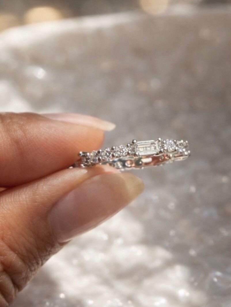 Gorgeous silver plated ring with Zircon Eternity Band ✨ Luxe Engagement Style ✨  Fall in love with the brilliance of this silver-plated brass engagement band, designed to capture light from every angle. Featuring an elegant mix of square and oval-cut zirc