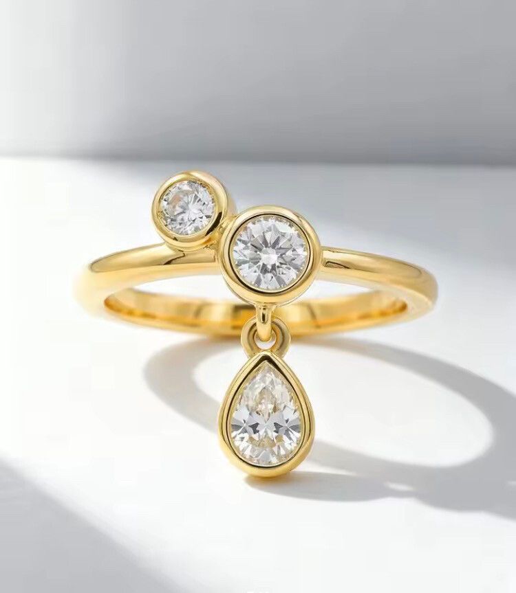 ✨ Toi et Moi Drop Moissanite Ring ✨ Radiant Love Symbol ✨  A truly unique engagement-style ring designed to capture attention. Featuring 3 brilliant moissanites, this delicate toi et moi setting symbolizes two souls becoming one, elevated by a graceful dr