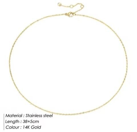 Dainty Gold Necklace – Minimalist Elegance  A delicate, high-end piece designed for effortless layering and everyday wear. 	•	18k gold-filled stainless steel – waterproof, tarnish-free, hypoallergenic, and never fades. 	•	Ultra-dainty and lightweight – pe
