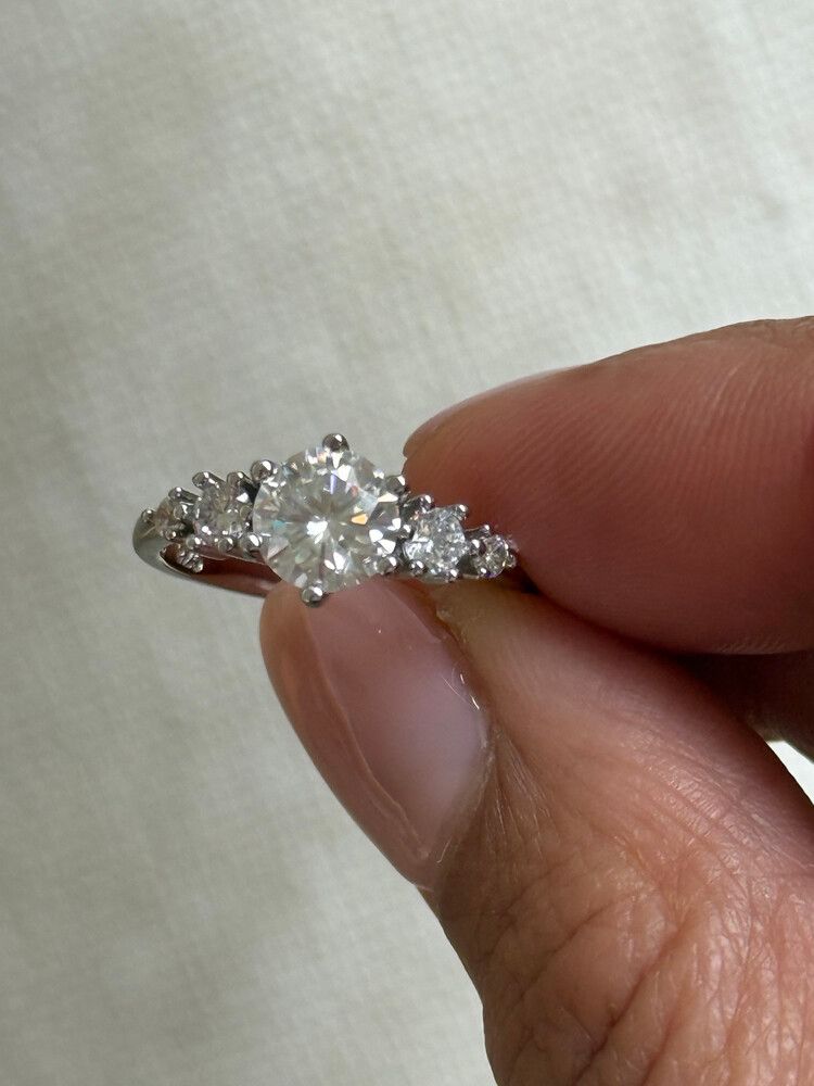 ✨ Genuine Moissanite Engagement Ring ✨  the kind of ring that makes people stop and ask if it’s a real diamond. insanely sparkly genuine moissanite stones set on genuine sterling silver stamped 925, with that luxury icy shine that catches light from every