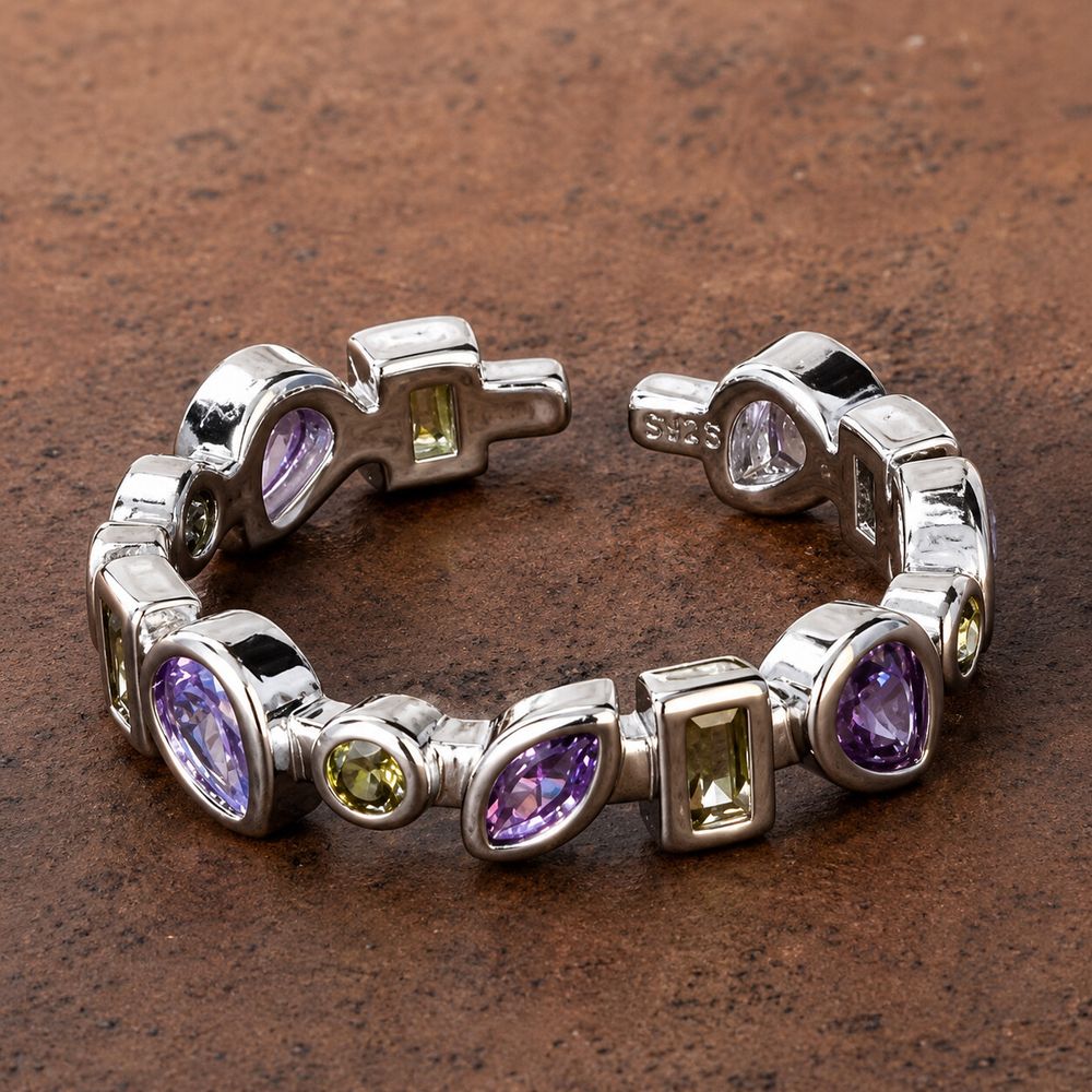 ✨ Genuine Amethyst Peridot Sterling Silver Ring Adjustable ✨  A colourful genuine gemstone ring made from authentic 925 sterling silver. Set with natural purple amethyst and green peridot stones in mixed cuts, it has a delicate vintage-inspired look while