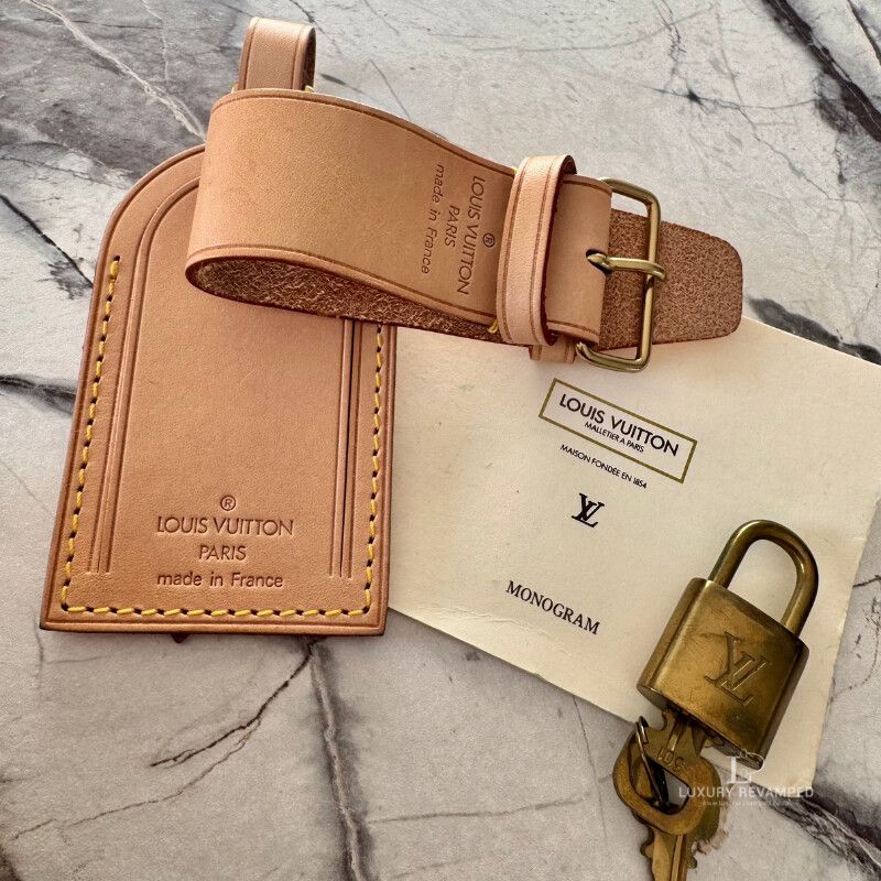 LOUIS VUITTON TRAVEL ACCESSORY SET — PADLOCK & KEYS, LUGGAGE TAG & POIGNET (ATA-LV-1152)