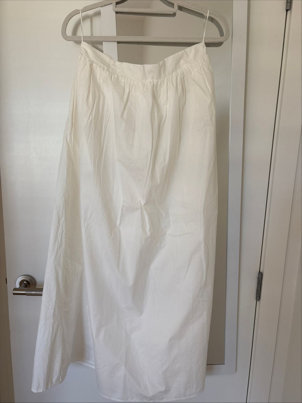Atmos and Here white skirt