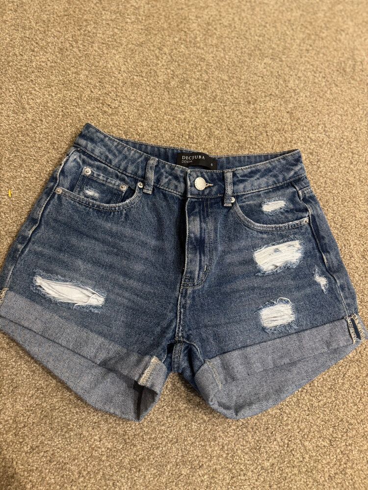 Ripped denim mid-rise shorts