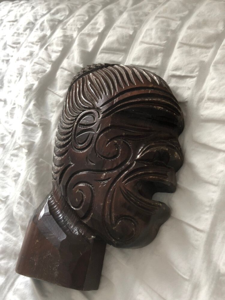 wooden face carving
