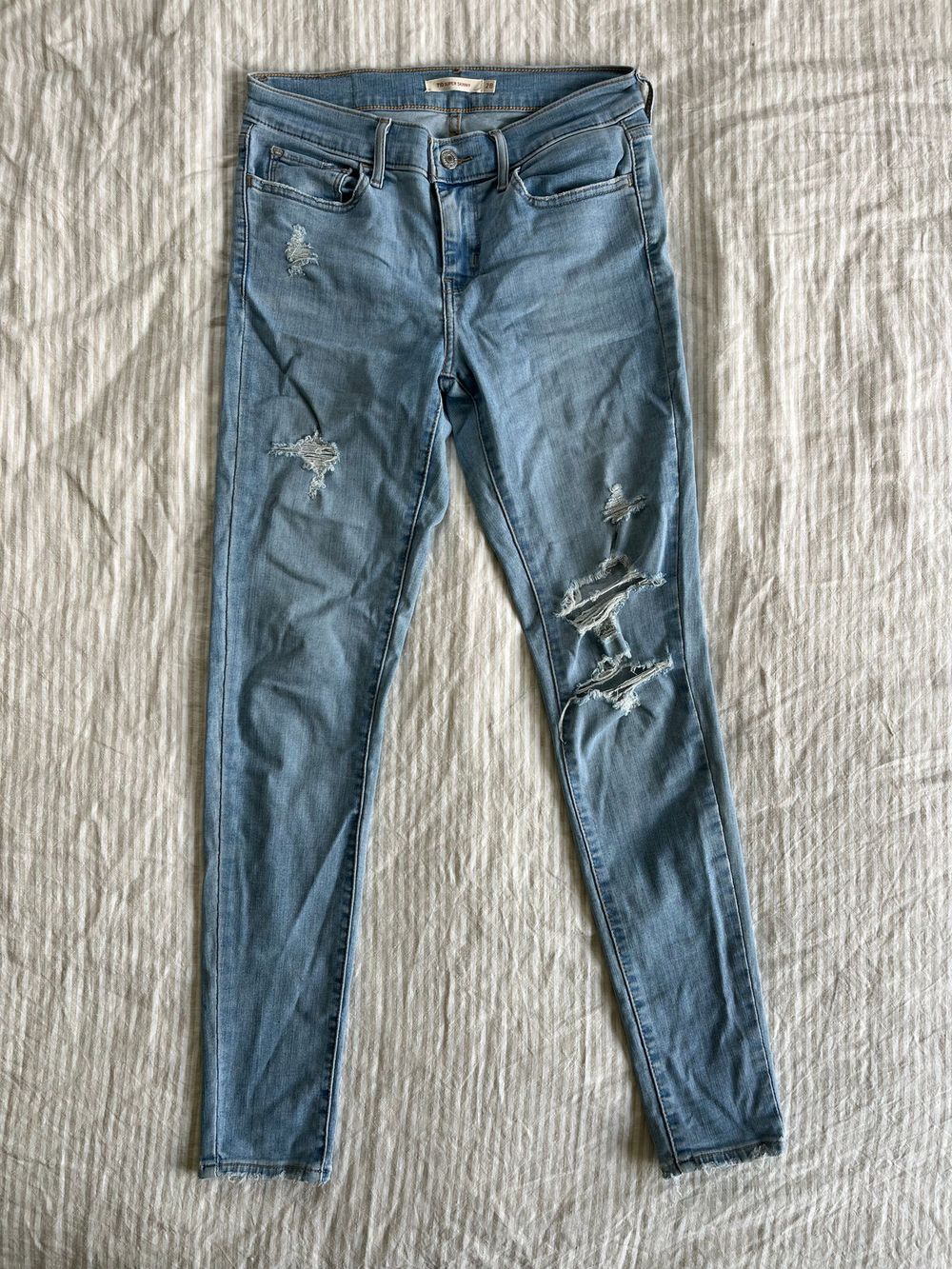 Levi's 710 Super Skinny, ripped light blue jeans