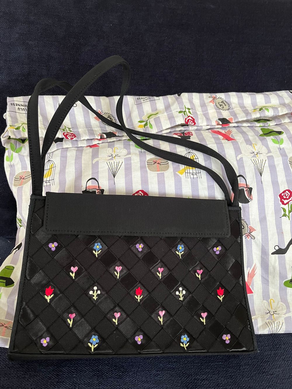 Small handbag with storage bag