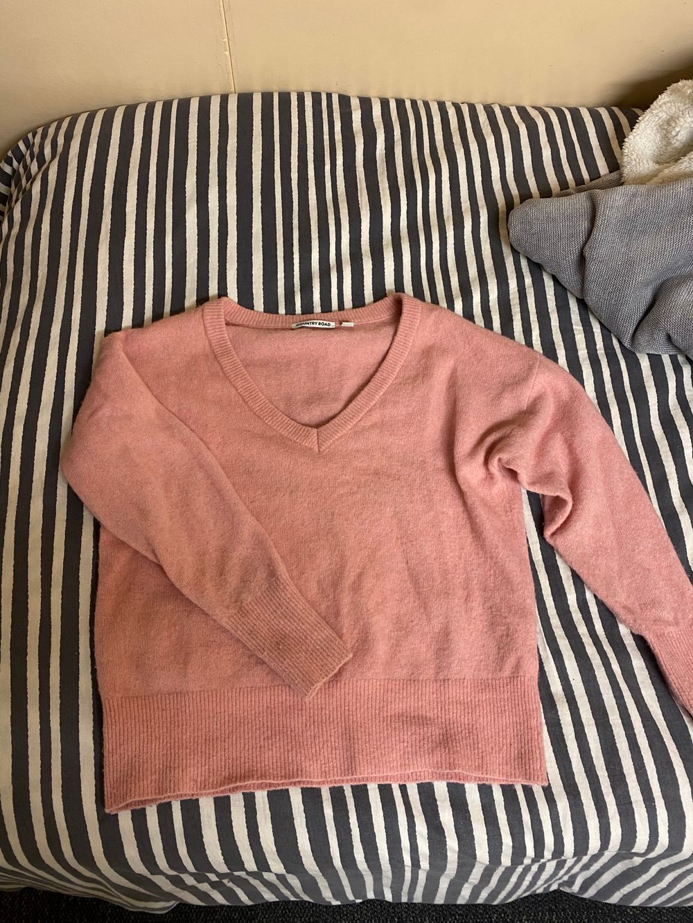 Pink woollen country road knit.