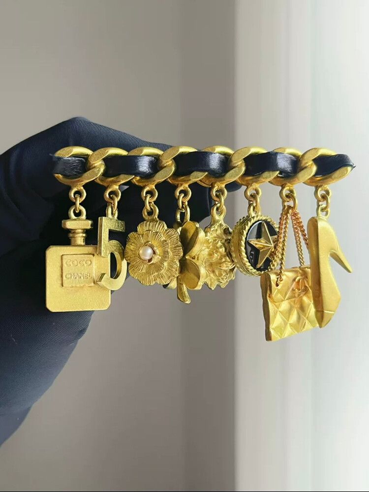 Authentic Chanel Vintage 1995 leather-and-chain Icons multi-element brooch