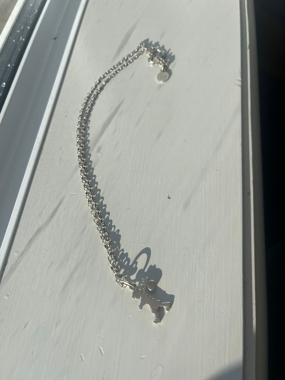 Karen walker runaway girl necklace